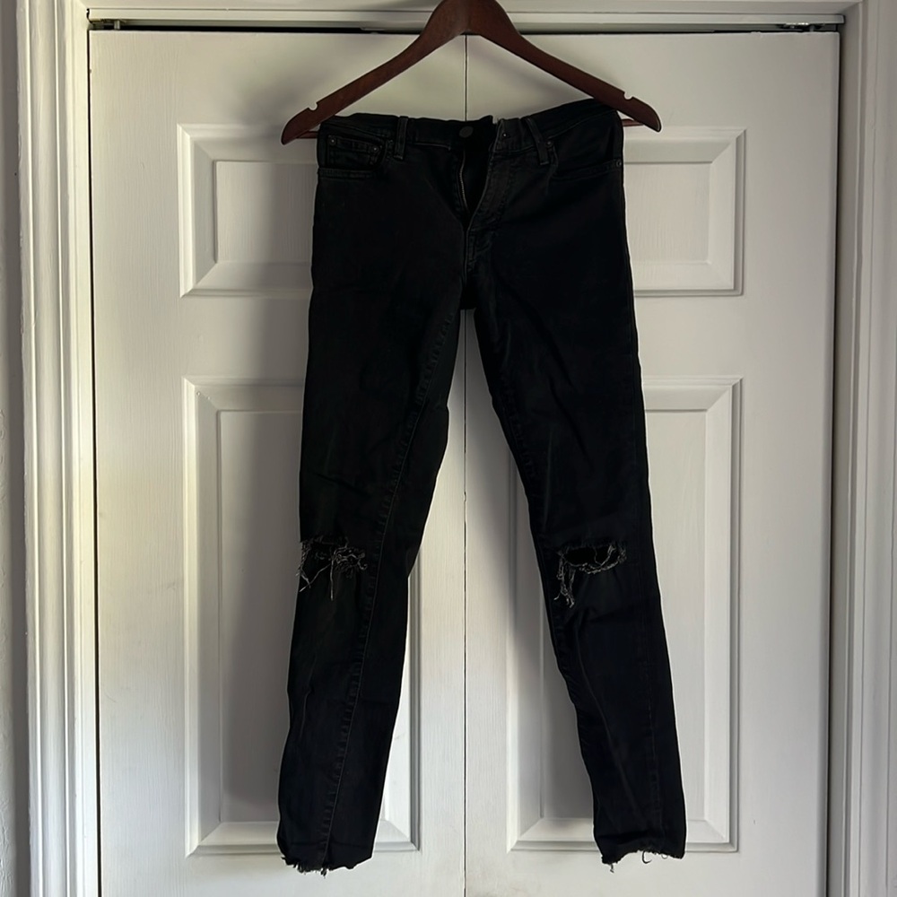 Able Black Skinny Jeans with knee holes and raw edge